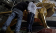Two people demonstrate inside the Mitikah Shopping Centre during its inauguration in Mexic...