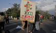 A group of people demonstrate outside the Mitikah Shopping Centre in Mexico City, which in...