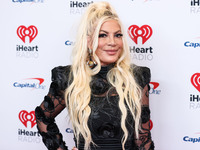 Tori Spelling poses in the press room at the 2022 iHeartRadio Music Festival - Night 1 held at the T-Mobile Arena on September 23, 2022 in L...