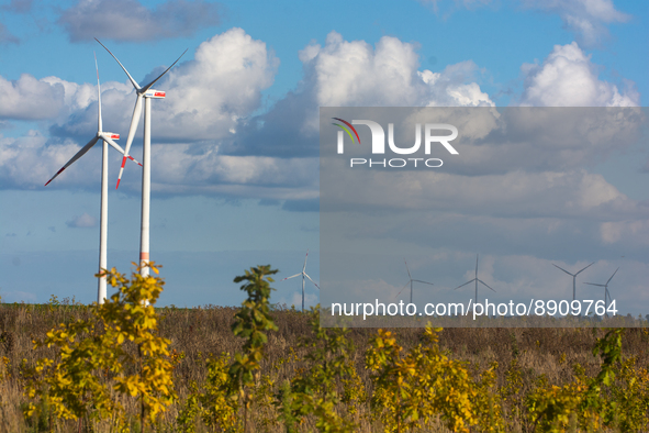 general view of wind farms are seen from the field in Juenchen, Germany on September 25, 2022 