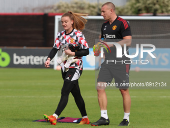 DAGENHAM ENGLAND - SEPTEMBER  25 :Sophie Baggaley of Manchester United Women and Ian Wilcock Goalkeeping Coach of Manchester United Women...