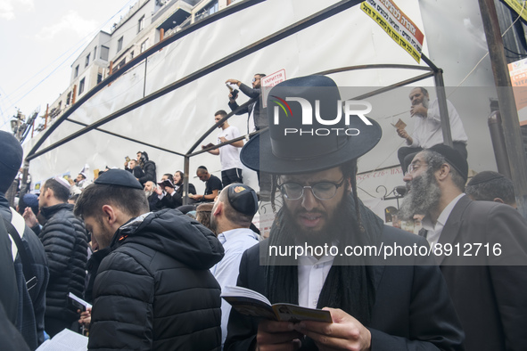Orthodox Jewish pilgrims pray near the tomb of Rabbi Nachman while celebrating Rosh Hashanah, the Jewish New Year,  amid Russia continues th...