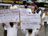  People from various civil organizations join the March for Peace and Unity of Mexico in Mexico City. The demonstrators reject the militariz...