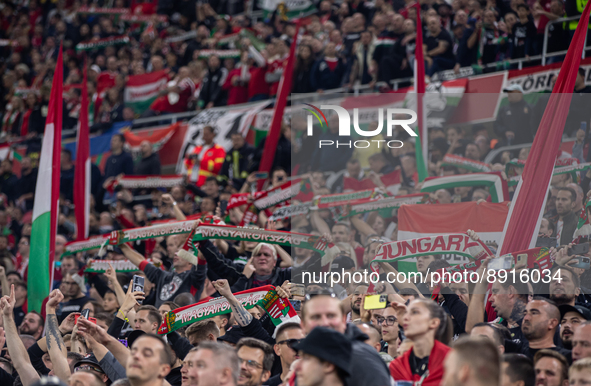 Hungarian fans and tricolor flags during the National anthem before the UEFA Nations League A3 match at Puskás Aréna on Sept 26, 2022 in Bud...