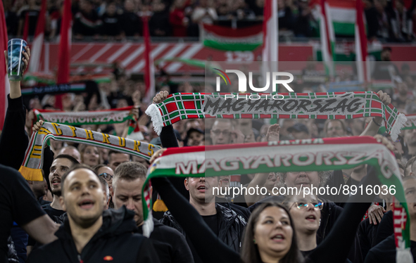 Hungarian fans and tricolor flags during the National anthem before the UEFA Nations League A3 match at Puskás Aréna on Sept 26, 2022 in Bud...