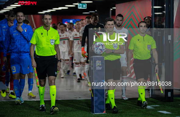 Referee Benoit Bastien pick up the ball before the UEFA Nations League A3 match at Puskás Aréna on Sept 26, 2022 in Budapest, Hungary. 