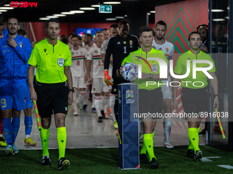 Referee Benoit Bastien pick up the ball before the UEFA Nations League A3 match at Puskás Aréna on Sept 26, 2022 in Budapest, Hungary. (