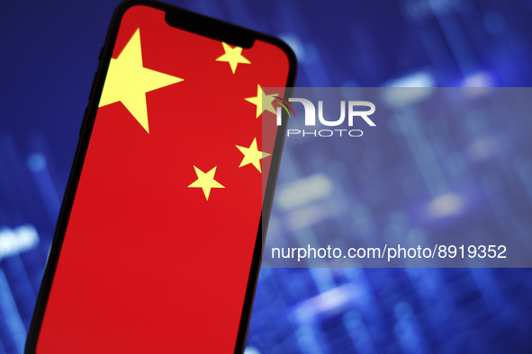 The Chinese flag is seen on a mobile phone in this photo illustration in Warsaw, Poland on 27 September, 2022. 