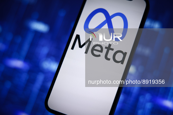 The Meta logo is seen on a mobile phone in this photo illustration in Warsaw, Poland on 27 September, 2022. 