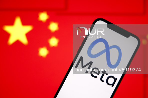 The Meta logo is seen on a mobile phone with the Chinese flag in the background in this photo illustration in Warsaw, Poland on 27 September...