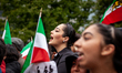People participate in a protest for Mahsa Amini, freedom in Iran, and solidarity with Iran...