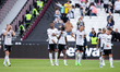 Fulham squad walks on during the Premier League match between West Ham United and Fulham a...