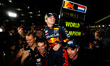 VERSTAPPEN Max (ned), Red Bull Racing RB18, celebrating race victory and world championshi...