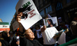 An Iranian woman reacts. A protest march took place in Toulouse in solidarity with women i...