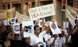 A placard reads 'Human rights in Iran are flouted'. A protest march took place in Toulouse...