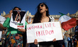 An Iranian woman reacts in front of the Capitole of Toulouse. . A protest march took place...