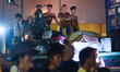MANILA, Philippines - Local residents looks on while guarding their personal belongings as...