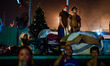 MANILA, Philippines - Local residents looks on while guarding their personal belongings as...