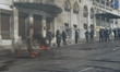 Protesters clash with riot police in central Athens during a general strike against auster...