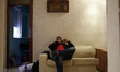 40 year old Luis Paulino Hernandez gestures as he waits to be evicted  in Madrid, Spain Ap...