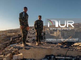 Iraqi autonomous Kurdish region's peshmerga forces inspect the liberated city of Sinjar, on November 14, 2015. Iraqi Kurdish leader Massud B...