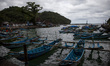 Fisherman doing their activities at Sadeng fisheries port, Gunung Kidul regency, Yogyakart...