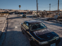 A man driving his car enter on November 14, 2015 in Sinjar, Iraq. Kurdish forces, with the aid of months of U.S.-led coalition airstrikes, l...