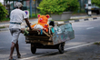 A man pushing a cart with garbage on November 03, 2022 in Colombo, Sri Lanka 