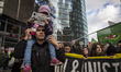 Hundreds of activists marched in solidarity with immigrants, including a group of Afghans...