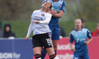 DEE BRADLEY of Durham Women challenges for a header with Ella Rutherford of Charlton Athle...