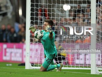 Newcastle United's Nick Pope makes his first penalty save during the shoot out to decide Carabao Cup Third Round match between Newcastle Uni...