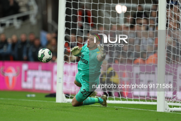 Newcastle United's Nick Pope makes his second penalty save during the shoot out to decide Carabao Cup Third Round match between Newcastle Un...