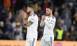 Leeds United's Mateusz Klich and Leeds United's Sam Greenwood applauds the fans after  the...