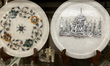 Marble plates with inlayed with precious stones displayed at a shop near the Taj Mahal in...