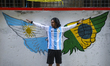 Fans gather in front of a graffiti to take pictures ahead of FIFA World Cup Qatar 2022 in...