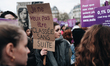 A demonstrator holds a sign with the slogan "I don't want to be dismissed" during a demons...