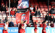 A Liverpool fans fly flags and banners in the stands during Barclays Women's Super League...
