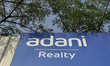 A logo of Adani Reality is seen in Mumbai, India, 23 November, 2022. Adani Group's Founder...