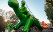 NEW YORK, NEW YORK - NOVEMBER 23: The Sinclair Oil Dino and Baby Dino balloon is being inf...