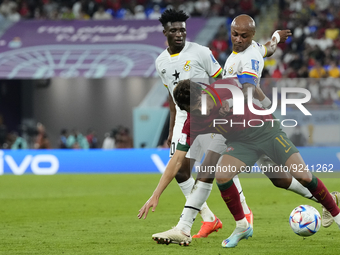 Joao Felix Second Striker of Portugal and Atletico de Madrid and Andre Ayew Left Winger of Ghana and Al-Sadd SC compete for the ball during...