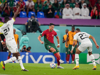(7) CRISTIANO RONALDO of Portugal team battel on ball with (23) DJIKU Alexander of Ghana team during FIFA World Cup Qatar 2022  Group H foot...