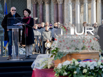 The parents of Valeria Solesin, Alberto and Luciana stand in front of the coffin of their daughter on Venice's San Marco Square on November...