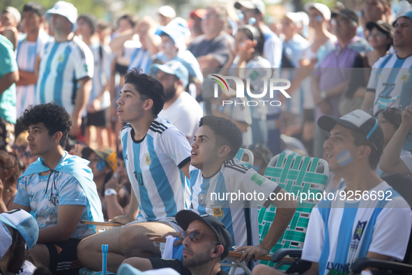 Fans of the Argentine soccer team attend a Fan Fest to watch the match between Argentina and Mexico at the World Cup, hosted by Qatar, in Bu...