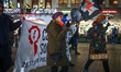 Activists during the 'Our Struggle Still Continues' protest in Krakow's Market Square, on...