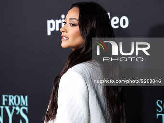 Canadian actress and model Shay Mitchell wearing a The Mannei suit with PIFERI shoes and Tiffany and Co. jewelry arrives at the Los Angeles...