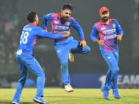 Afghanistan's Rashid Khan celebrates with their teammates after taking the wicket of Sri Lanka during the final one-day international cricke...