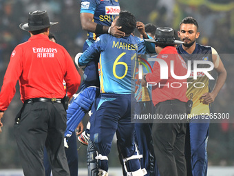Sri Lanka’s Charith Asalanka celebrates with teammates after win their final one-day international cricket match between Sri Lanka and Afgha...