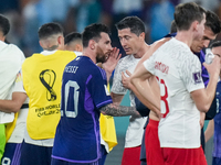 (10) MESSI Lionel of team Argentina and (9) LEWANDOWSKI Robert of team Poland after Argentina won the match at the FIFA World Cup Qatar 2022...