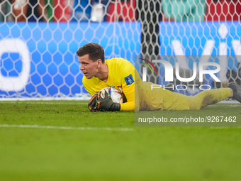 (1) SZCZESNY Wojciech of team Poland battle trying to score during the FIFA World Cup Qatar 2022 Group C match between Poland and Argentina...
