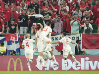 Hakim Ziyech attacking midfield of Morocco and Chelsea FC celebrates after scoring his sides first goal during the FIFA World Cup Qatar 2022...